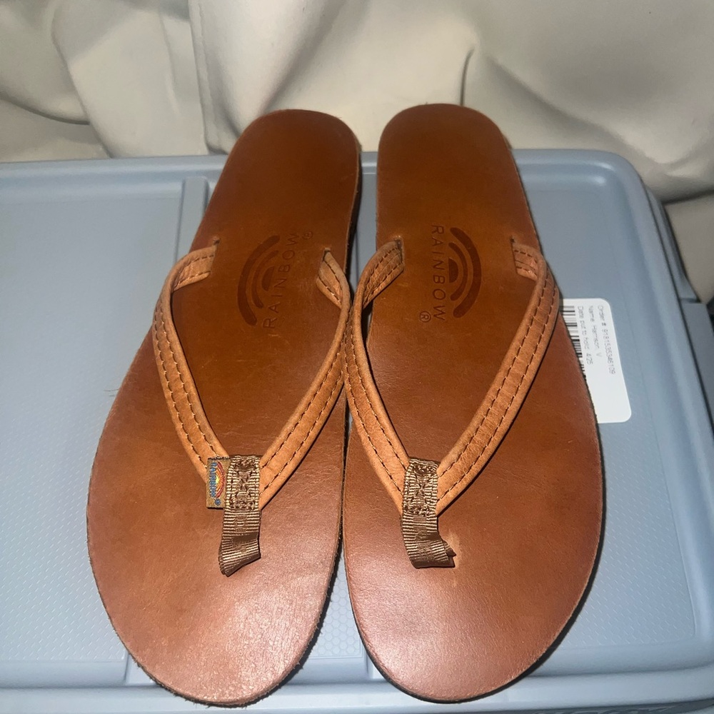 Rainbow flip flop sandals, NWOT. Women’s “8.5-9.5”